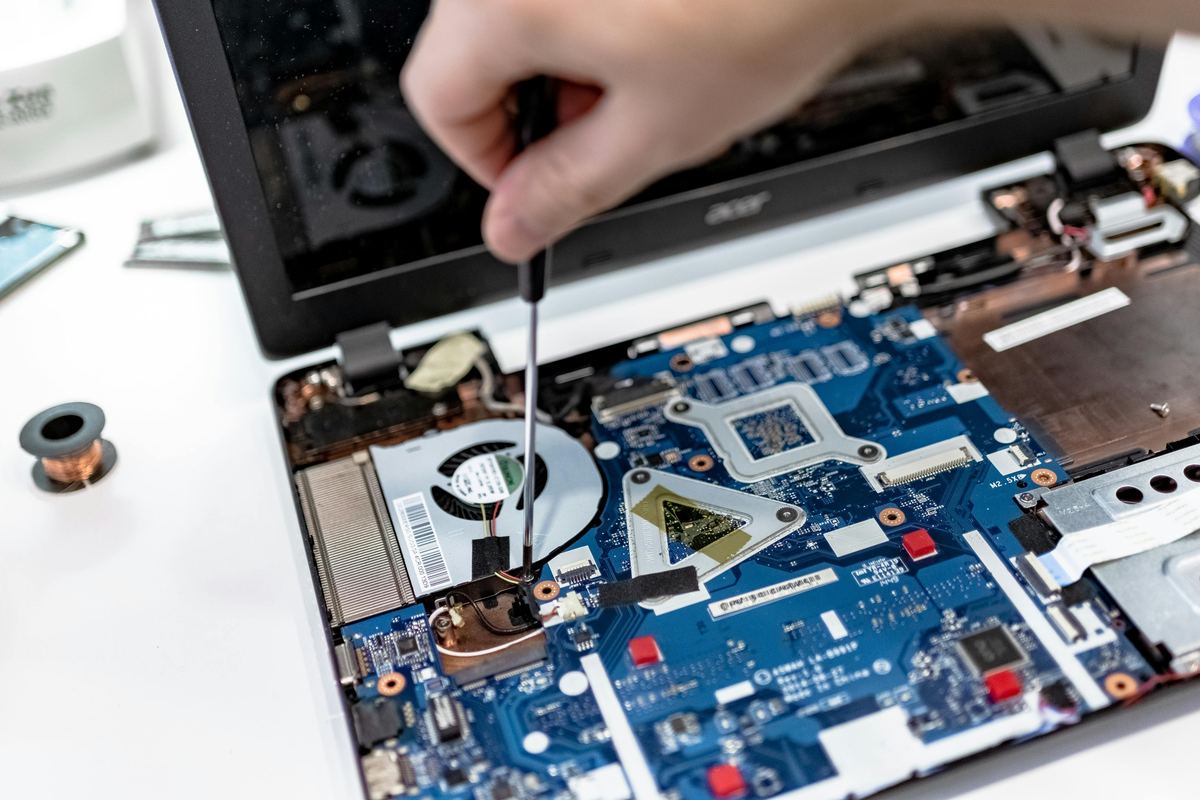 Technician repairing electronic equipment